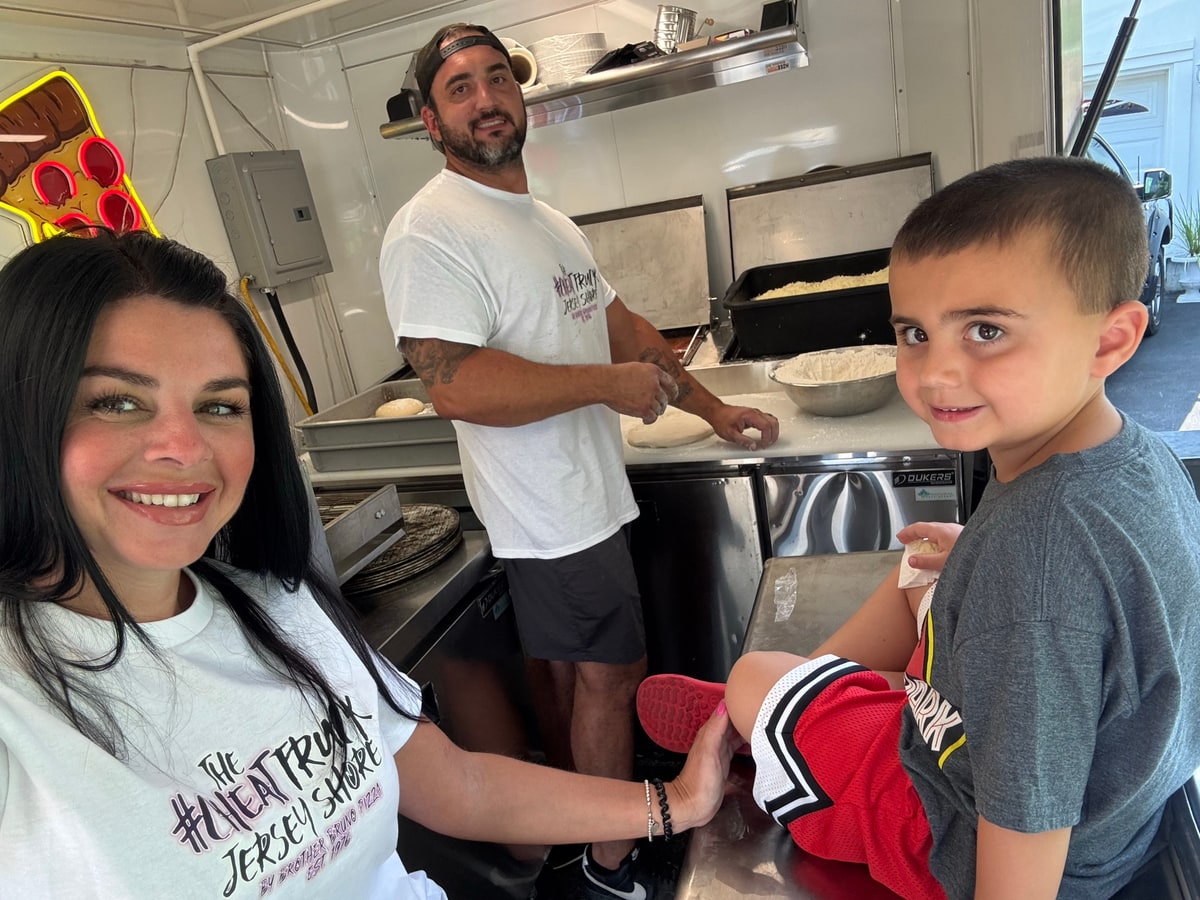 Mike Soltys with his family inside the Jersey Shore Cheat Truck