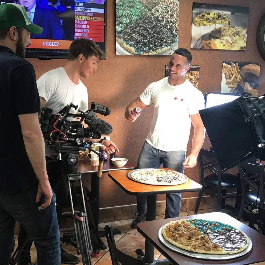 A film crew shooting dessert pizza in the Brother Bruno dining room